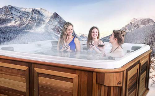 Women chatting in an Arctic Spas hot tub